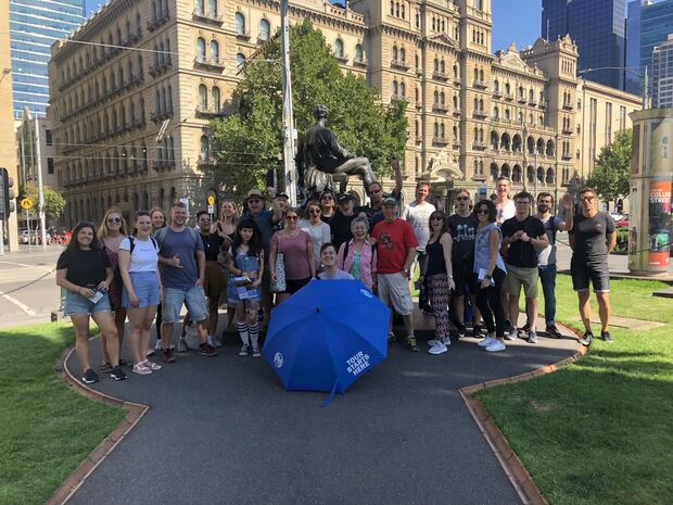 A large tour group outside the Hotel Windsor in March 2020